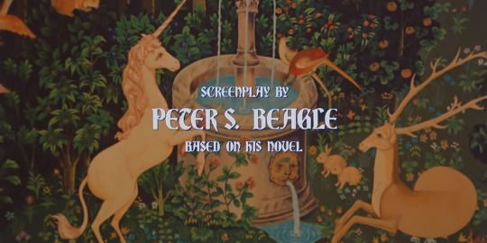 Still from The Last Unicorn. A unicorn drinks from a fountain alongside a bird and a deer. Credits say 'Screenplay by Peter S Beagle, based on his novel'